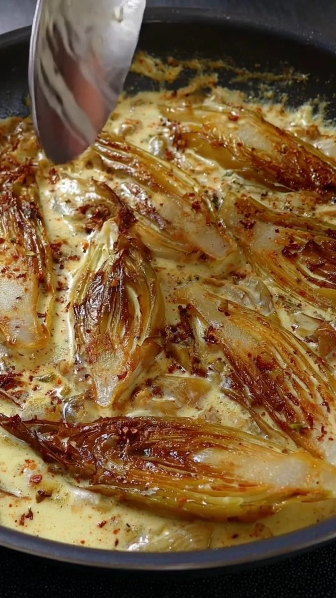 Endives braisées à la crème et au curry